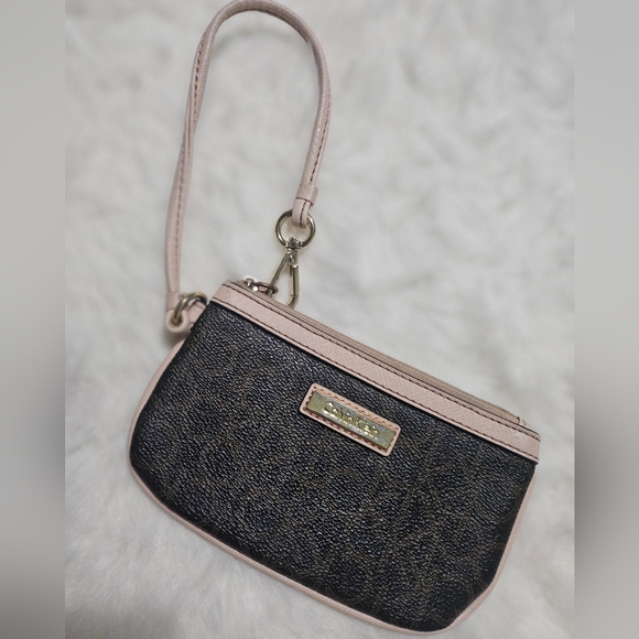 Calvin Klein Handbags - FREE - Calvin Klein Wristlet (just add on any bundle)